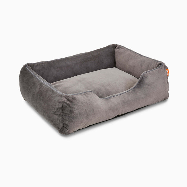 Dark Grey Sammy bolster dog bed in faux fur by Fuzi, washable dog beds, available in four beautiful colors and three sizes.