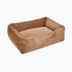 The Sammy bolster dog bed in a medium light brown faux fur by Fuzi, with a removable cover available in four beautiful colors and three sizes.
