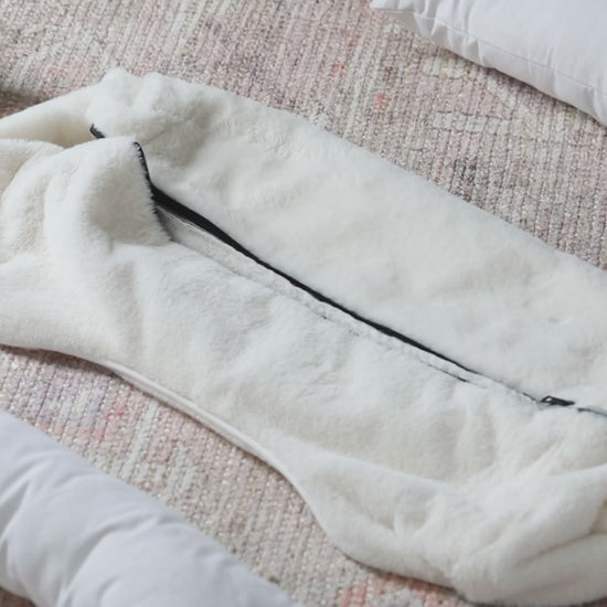Assembly instructions for the Sammy Bolster Luxury dog bed by Fuzi, with a washable cover for easy cleaning.